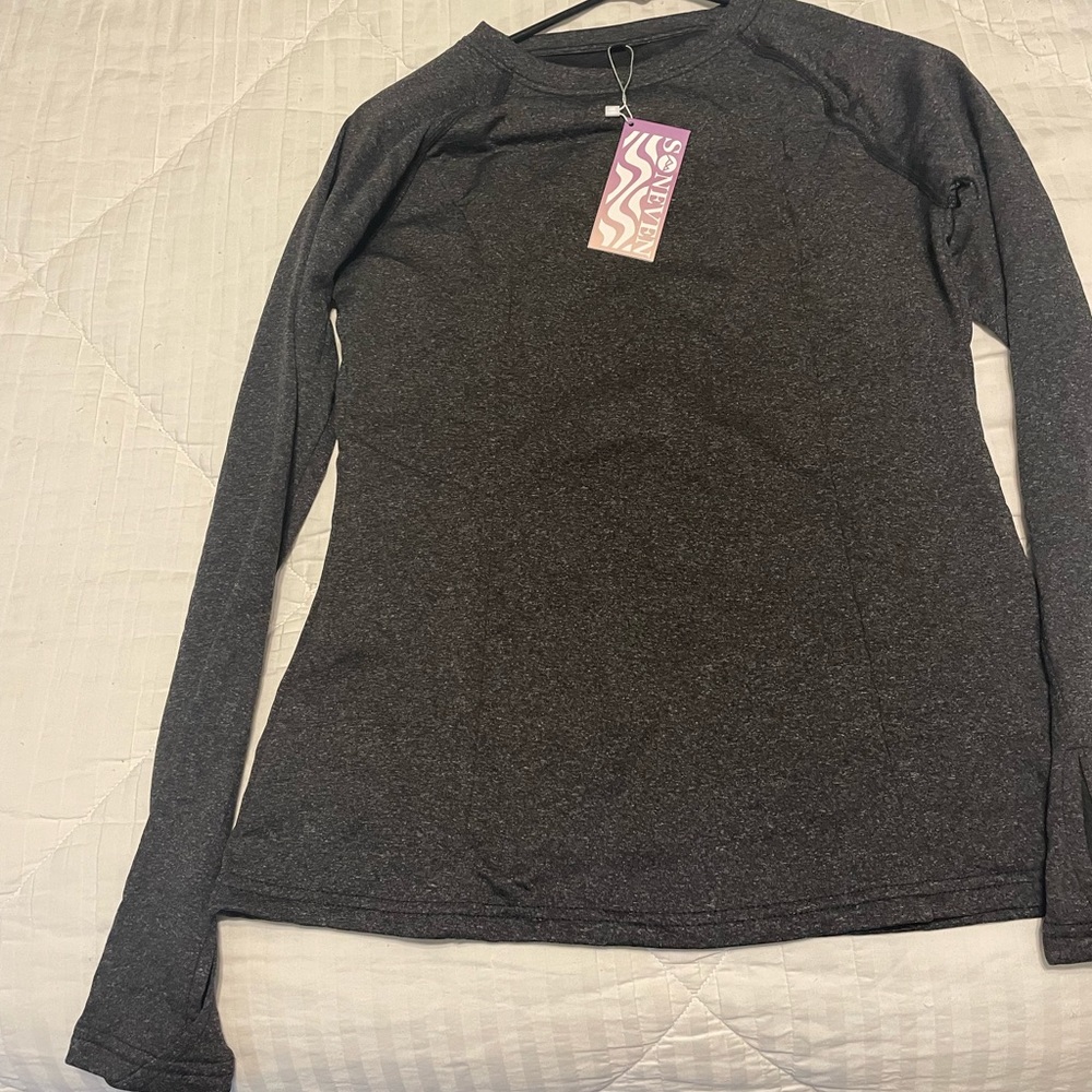 Long sleeve winter outdoor/ workout top. New with tags.